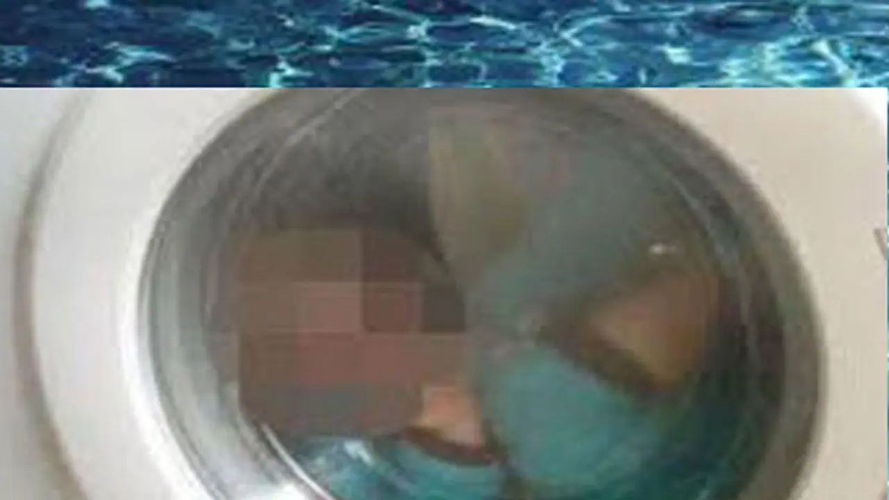 Three year old twins die after falling into washing machine Three year old twins die after falling into washing machine