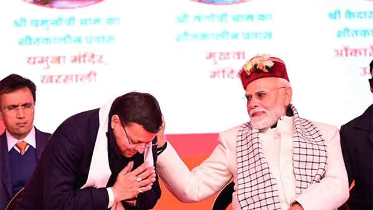 Prime Minister Narendra Modi with Pushkar Singh Dhami (Photo/ANI) Prime Minister Narendra Modi with Pushkar Singh Dhami (Photo/ANI)
