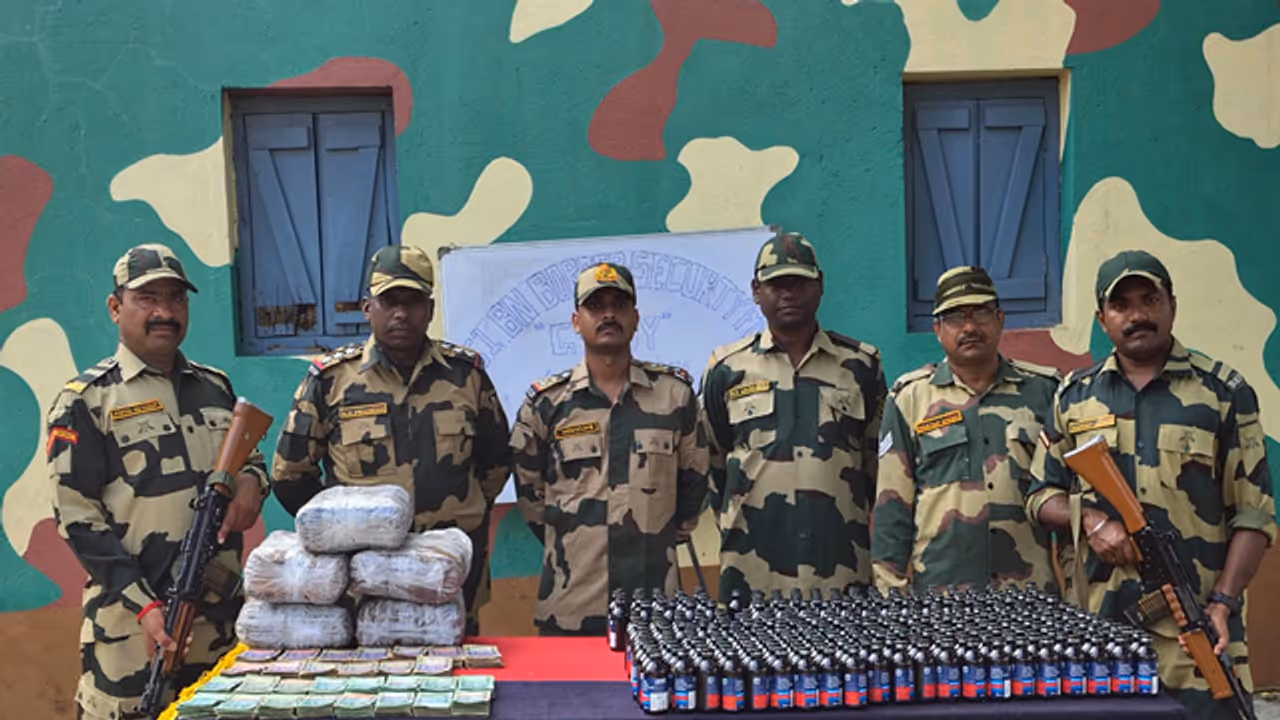 BSF South Bengal Frontier with the seized currency and contraband items. (Photo/ANI) BSF South Bengal Frontier with the seized currency and contraband items. (Photo/ANI)