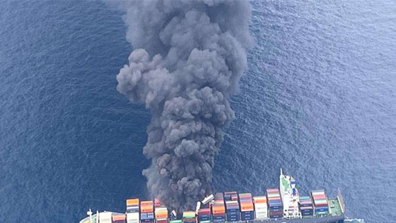 Image shows smoke rising following explosion onboard MV Wan Hai 503 (Image Credit: X/@IndiaCoastGuard) Image shows smoke rising following explosion onboard MV Wan Hai 503 (Image Credit: X/@IndiaCoastGuard)