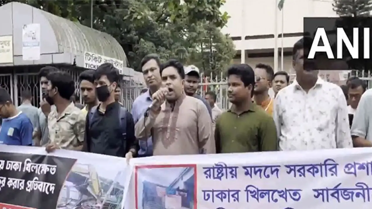 Minority groups formed human chain in Shahbagh to hold protest against Durga Temple demolition (Photo/ANI) Minority groups formed human chain in Shahbagh to hold protest against Durga Temple demolition (Photo/ANI)