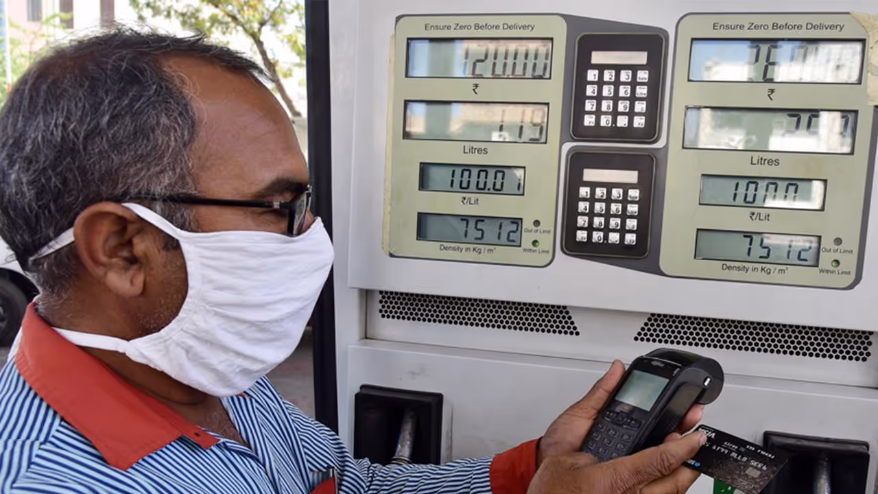 A person making fuel payment from a card (File Photo/ANI) A person making fuel payment from a card (File Photo/ANI)