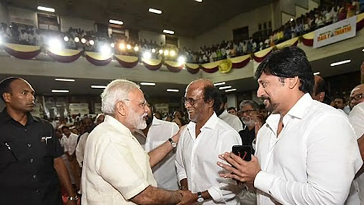 Modi greets Rajinikanth at Dina Thanthi platinum jubilee celebrations Modi greets Rajinikanth at Dina Thanthi platinum jubilee celebrations