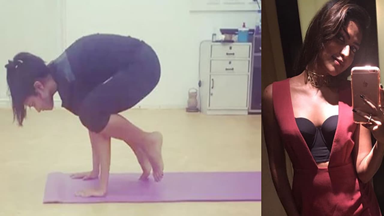 Watch: So cute! Amala Paul tries Kakasana Watch: So cute! Amala Paul tries Kakasana