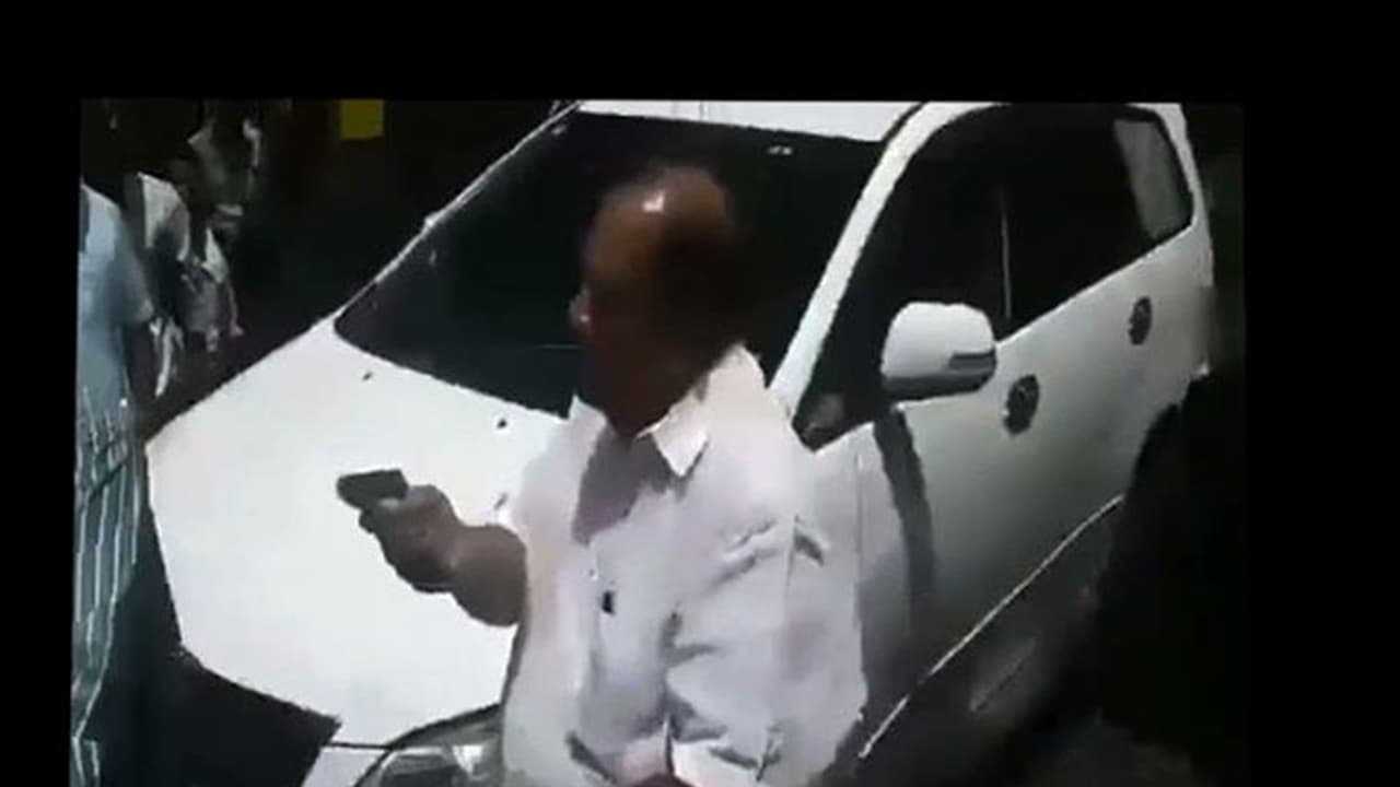 Kerala MLA points gun at estate workers, threatens to pour acid on them Kerala MLA points gun at estate workers, threatens to pour acid on them