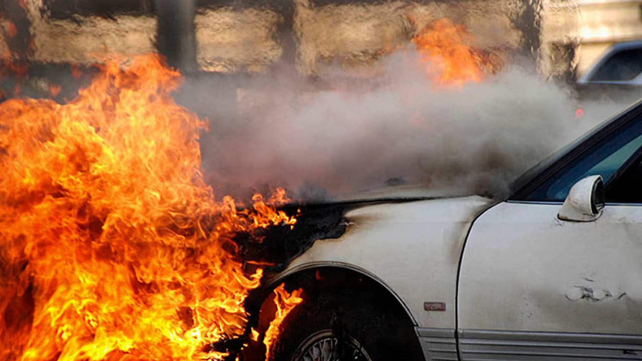 Ola cab driver sets car ablaze, wife dies, children injured Ola cab driver sets car ablaze, wife dies, children injured