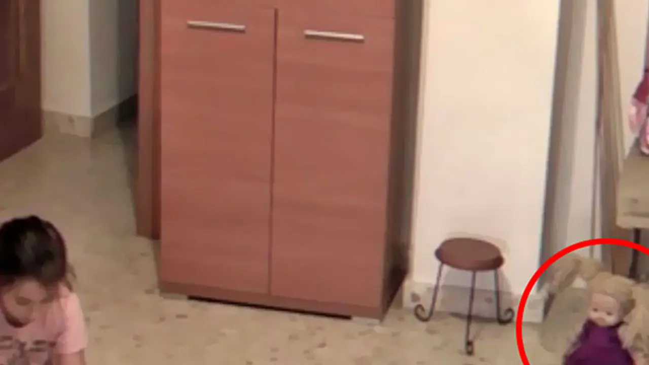 Watch: Lone doll moves its head on its own as child plays with another toy