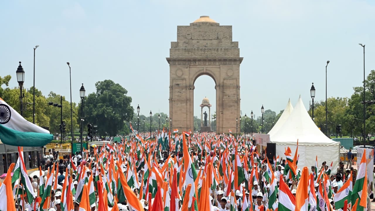 Children with the national flag at India Gate (File Photo/ANI) Children with the national flag at India Gate (File Photo/ANI)