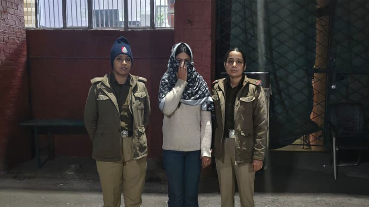 Chandigarh police with the arrested individual (Photo/ANI)