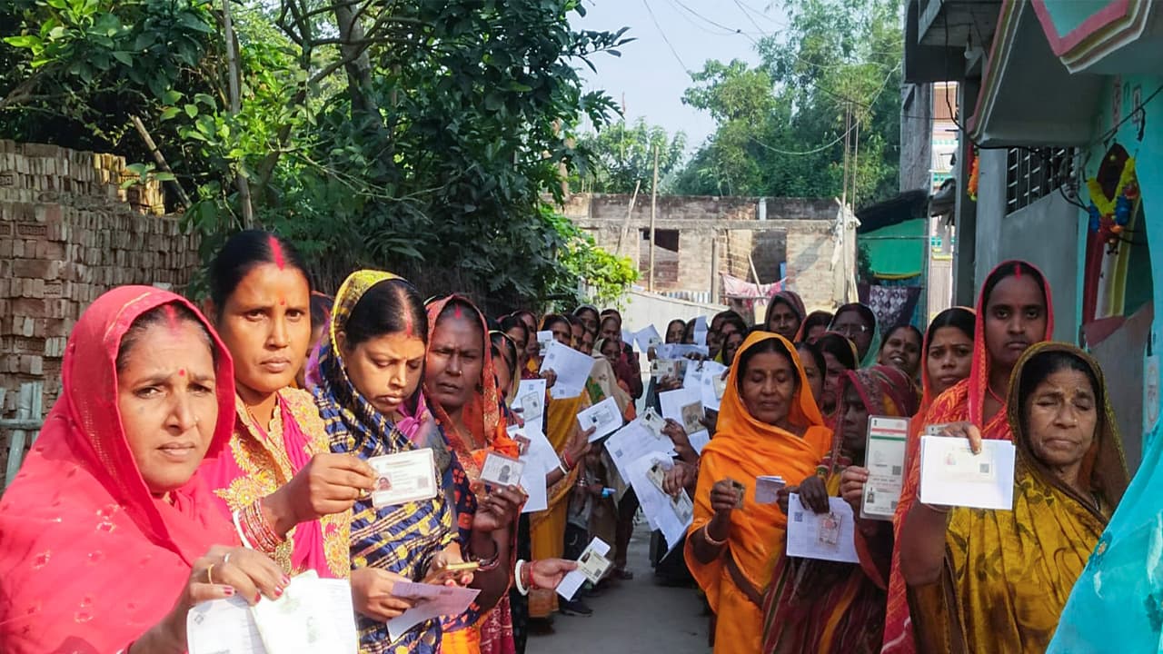 Women voters wait in a queue to cast their vote in Katihar in the second phase of the Bihar assembly election (Photo/ANI) Women voters wait in a queue to cast their vote in Katihar in the second phase of the Bihar assembly election (Photo/ANI)