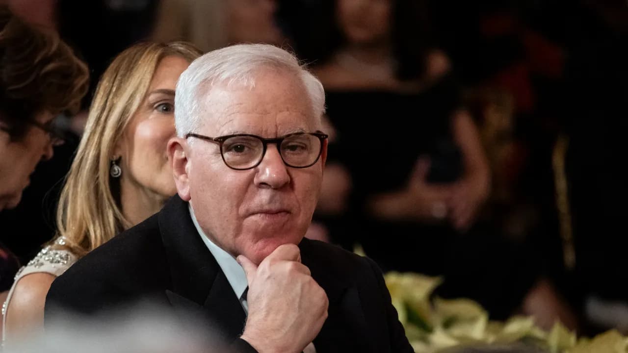 https://stocktwits.com/news articles/markets/equity/carlyle david rubenstein fed 50 bps rate cut too much scare markets/chwN0AyRdvO