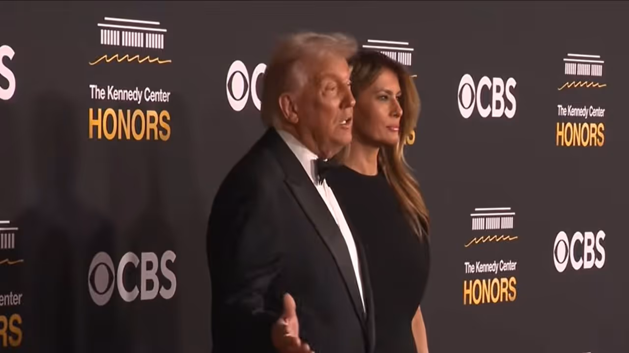US President Donald Trump and the First Lady arrive on the red carpet at the Kennedy Center Honors in Washington, DC. (Image Source: The White House/YouTube) US President Donald Trump and the First Lady arrive on the red carpet at the Kennedy Center Honors in Washington, DC. (Image Source: The White House/YouTube)