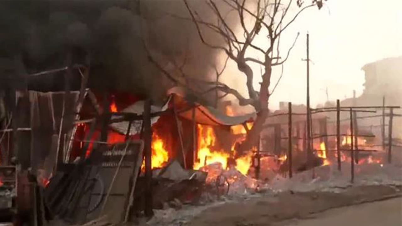 Thick black smoke engulfs the sky as a major fire breaks out in Market (Photo/ANI) Thick black smoke engulfs the sky as a major fire breaks out in Market (Photo/ANI)