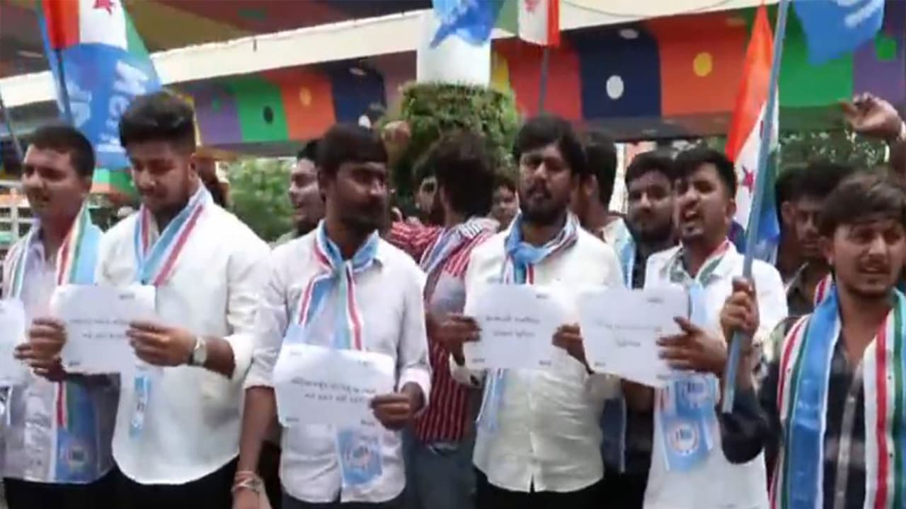 NSUI members protest in Ahmedabad (Photo/ANI) NSUI members protest in Ahmedabad (Photo/ANI)