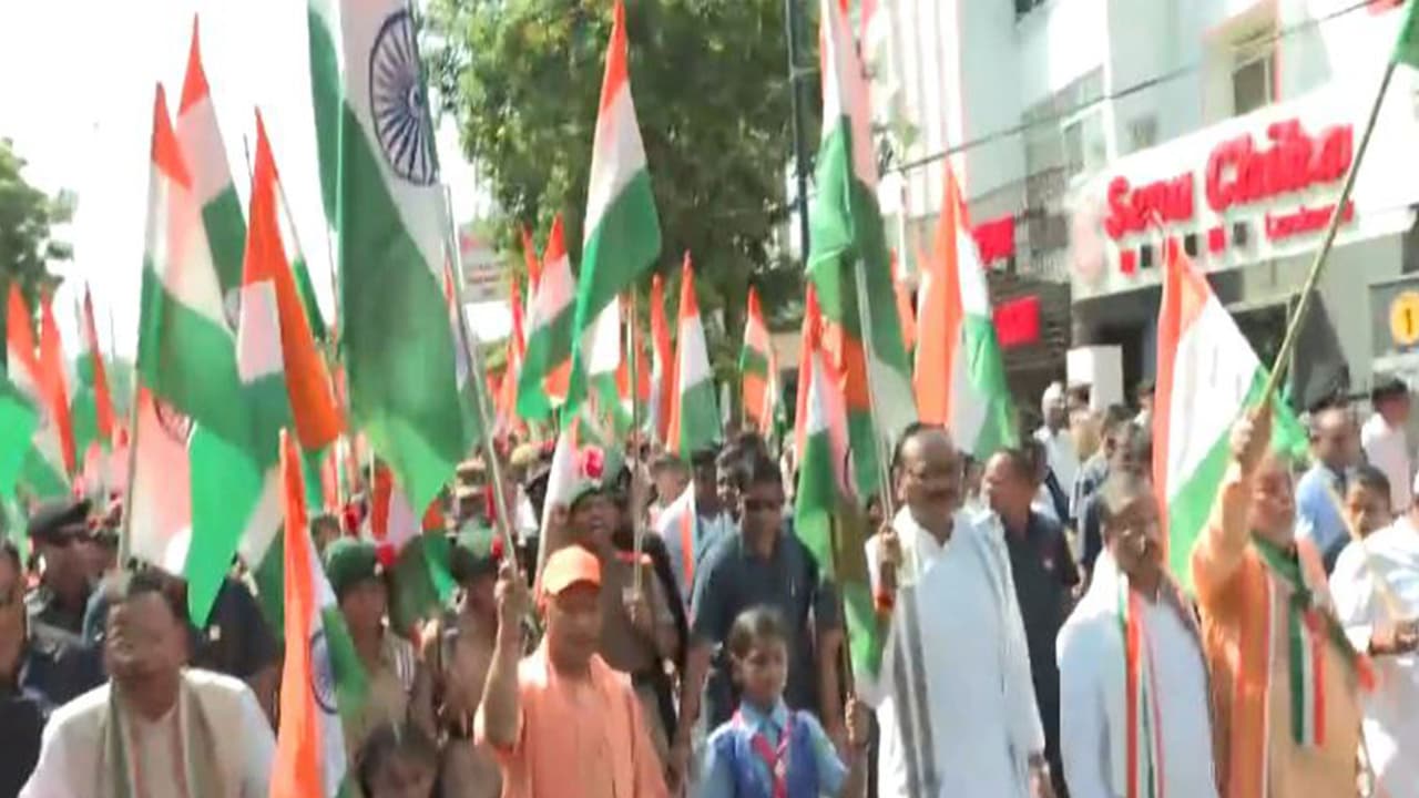 UP CM Yogi Adityanath participates in 'Tiranga Yatra’ in Lucknow (Photo/ANI) UP CM Yogi Adityanath participates in 'Tiranga Yatra’ in Lucknow (Photo/ANI)
