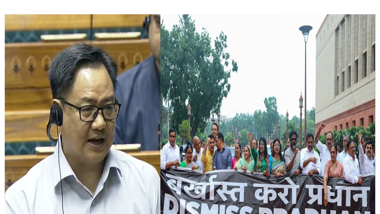 Union Minister Kiren Rijiju and the Opposition's protest outside Parliament (Photo/Sansad TV/ANI) Union Minister Kiren Rijiju and the Opposition's protest outside Parliament (Photo/Sansad TV/ANI)