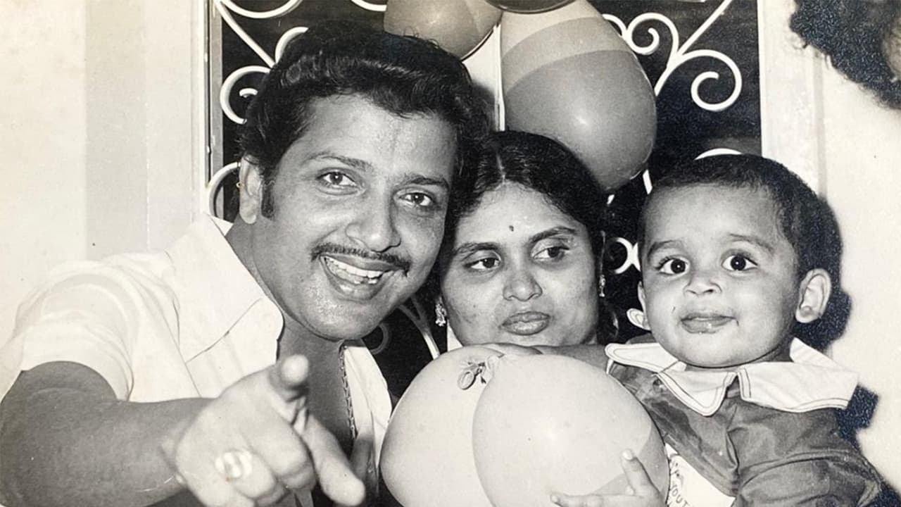 Childhood picture of Karthi with parents Sivakumar and Lakshmi (Photo/X/@Karthi_Offl) Childhood picture of Karthi with parents Sivakumar and Lakshmi (Photo/X/@Karthi_Offl)