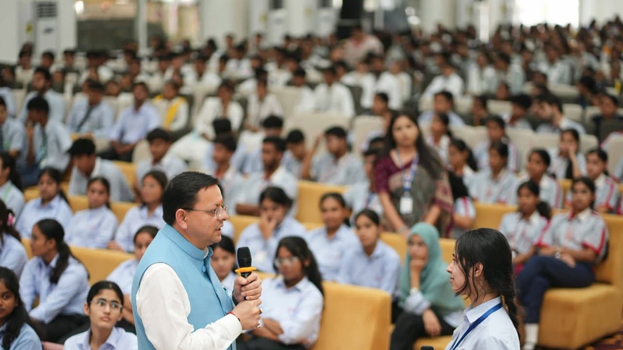 Pushkar singh Dhami interacting with students at Kashipur (Photo/ANI) Pushkar singh Dhami interacting with students at Kashipur (Photo/ANI)