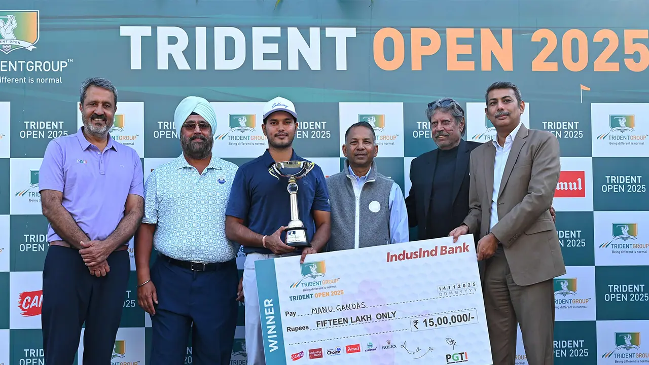 Manu Gandas lifting Trident Open 2025 trophy (Image: PGTI) Manu Gandas lifting Trident Open 2025 trophy (Image: PGTI)
