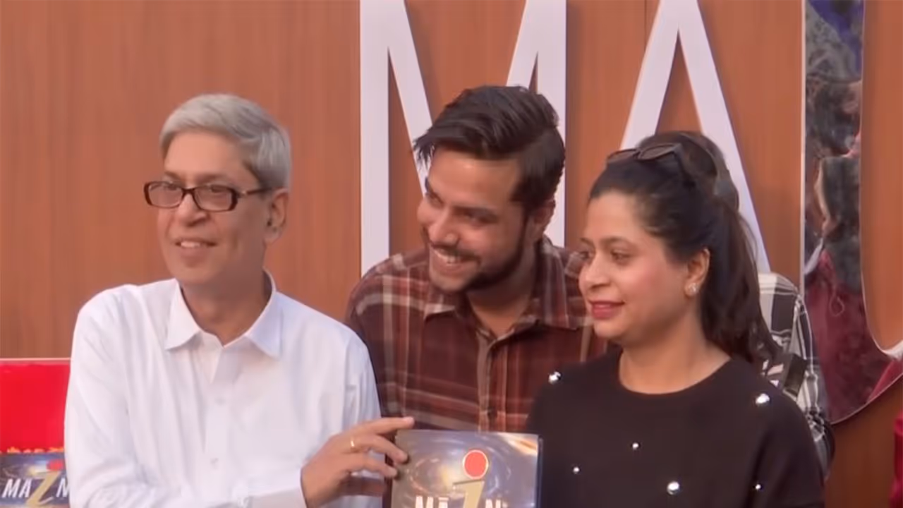 Author Ratneshwar with the world's costliest book 'Main' at the Patna Book Fair in Patna (Photo/ANI)