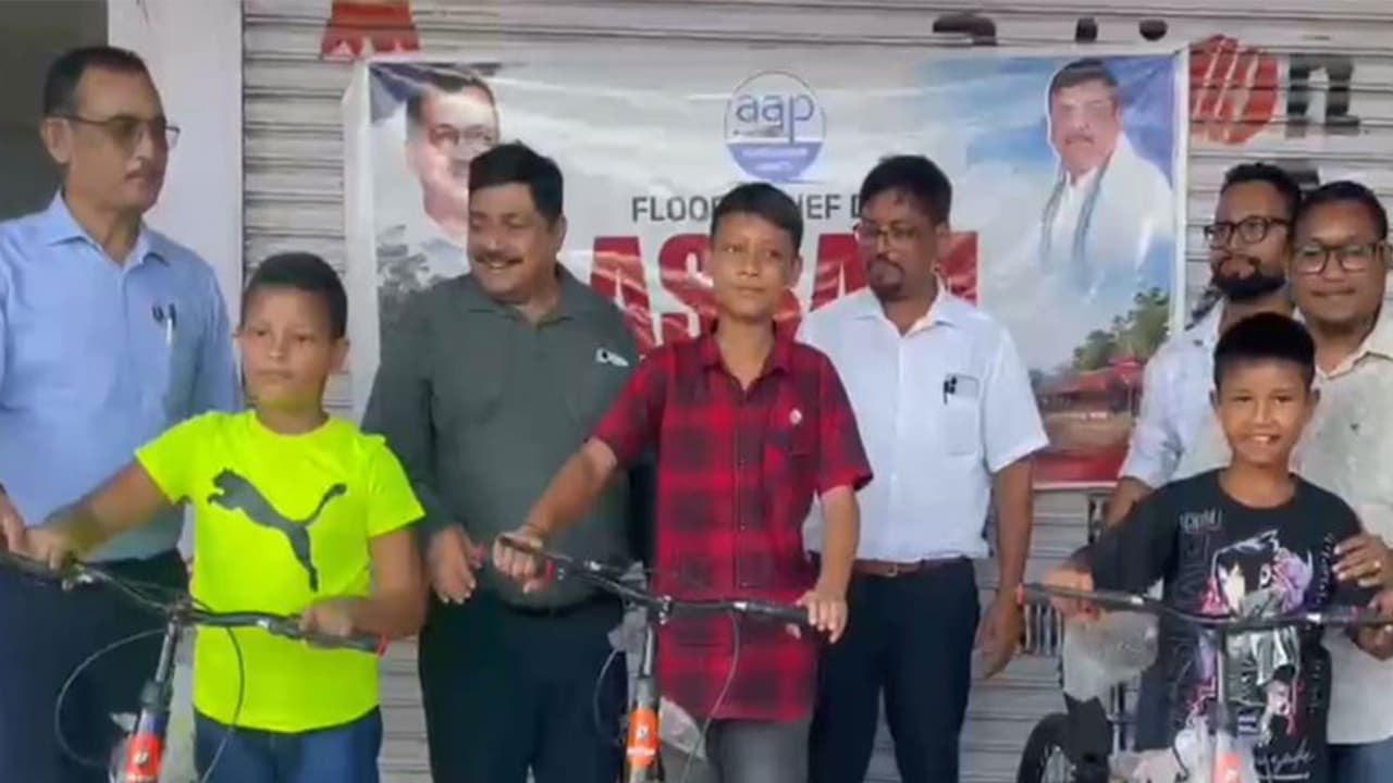 Flood hit students receive bicycles in Assam (Photo/ANI) Flood hit students receive bicycles in Assam (Photo/ANI)