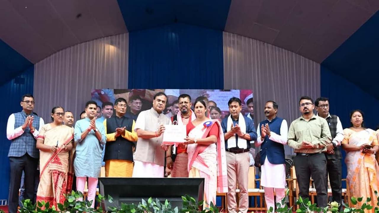 Assam Chief Minister Himanta Biswa Sarma presents cheques to beneficaries (Photo/ANI)
