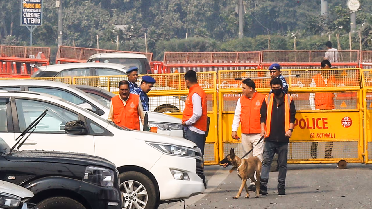 Bomb disposal squads examine the site of the car blast near Red Fort (File Photo/ANI) Bomb disposal squads examine the site of the car blast near Red Fort (File Photo/ANI)