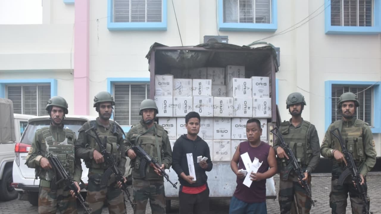 Seized Foreign Cigarettes in Assam (Photo/ANI) Seized Foreign Cigarettes in Assam (Photo/ANI)