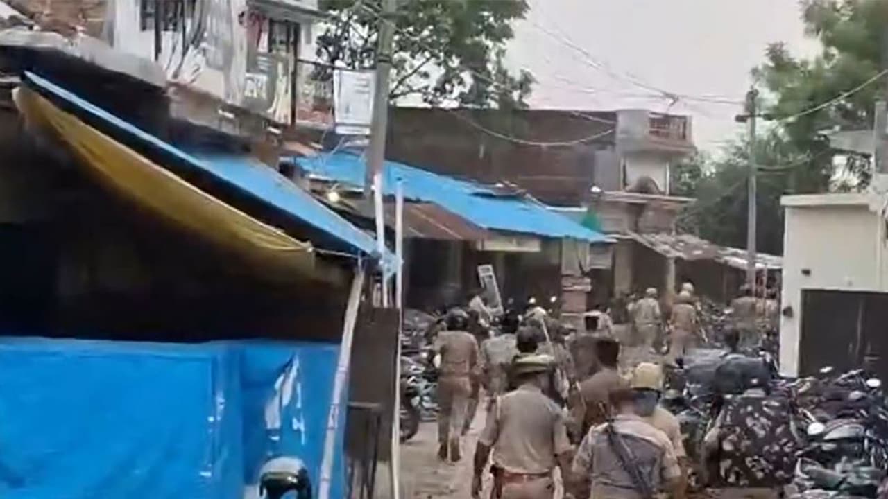 Visuals from the spot show heavy police deployment and a cleared road (Photo/ANI) Visuals from the spot show heavy police deployment and a cleared road (Photo/ANI)