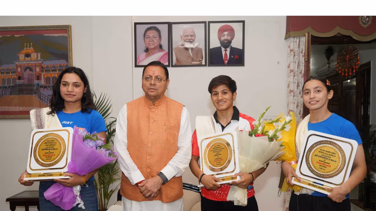 CM Pushkar Singh Dhami felicitates Nikita Chand, Kajal Farswan, Aarti Dhariyal. (Photo/UK CMO) CM Pushkar Singh Dhami felicitates Nikita Chand, Kajal Farswan, Aarti Dhariyal. (Photo/UK CMO)