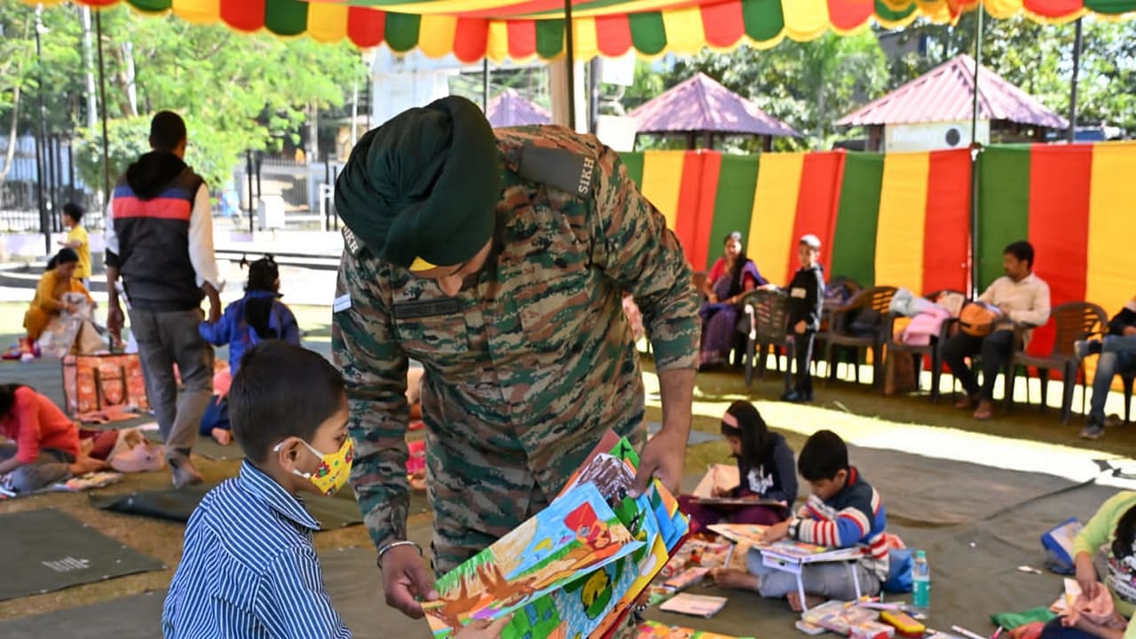 Indian army personnel with a kid during Vijay Diwas celebrations in Agartala on Sunday. (Photo/Army HQ, Shalbagan, Agartala) Indian army personnel with a kid during Vijay Diwas celebrations in Agartala on Sunday. (Photo/Army HQ, Shalbagan, Agartala)