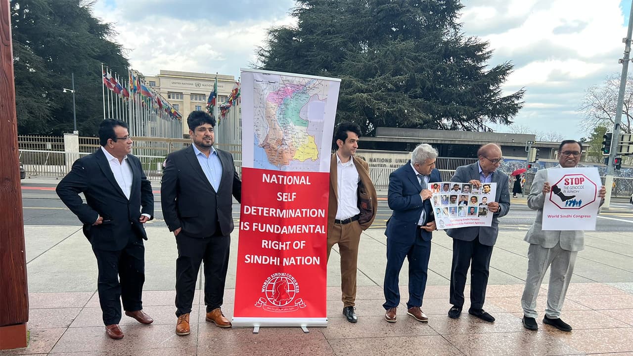 Members of the World Sindhi Congress protest at Place des Nations in Geneva during the UNHRC session, holding placards highlighting alleged human rights violations in Sindh, Pakistan (Photo/ANI) Members of the World Sindhi Congress protest at Place des Nations in Geneva during the UNHRC session, holding placards highlighting alleged human rights violations in Sindh, Pakistan (Photo/ANI)