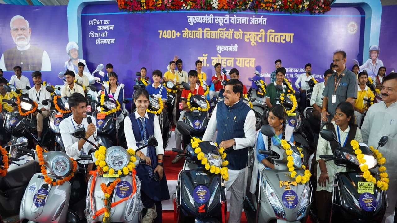 MP CM Mohan Yadav distributes scooties to meritorious Class 12 students (Photo/ X @CMMadhyaPradesh) MP CM Mohan Yadav distributes scooties to meritorious Class 12 students (Photo/ X @CMMadhyaPradesh)