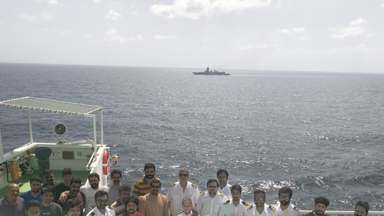 Crew with Indian flag and poster thanking Indian navy (Photo/ Special arrangements) Crew with Indian flag and poster thanking Indian navy (Photo/ Special arrangements)