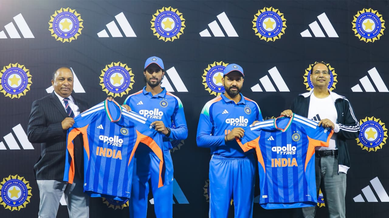 Tilak and Rohit with BCCI secretary Saikia during T20 WC jersey reveal. (Photo: BCCI/Adidas India) Tilak and Rohit with BCCI secretary Saikia during T20 WC jersey reveal. (Photo: BCCI/Adidas India)