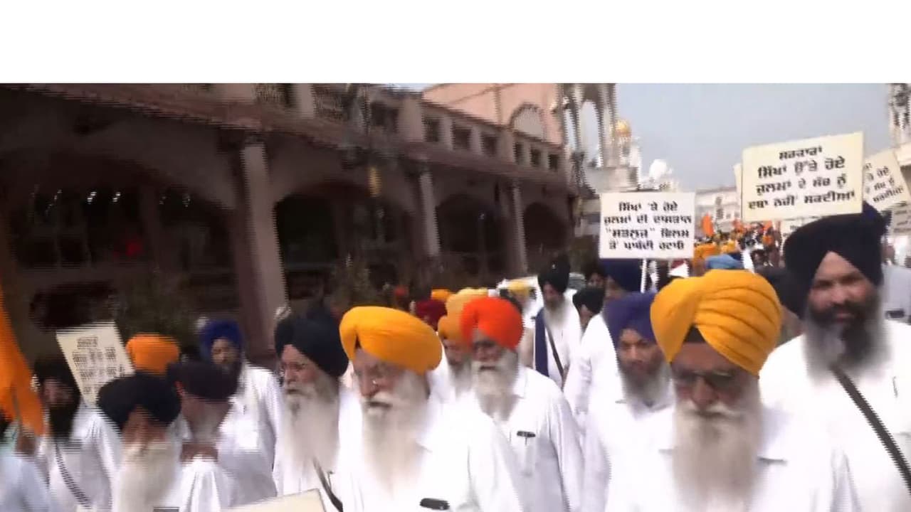 SGPC holds protest march in Amritsar, seeks lifting of ban on film 'Satluj' (Photo/ANI) SGPC holds protest march in Amritsar, seeks lifting of ban on film 'Satluj' (Photo/ANI)