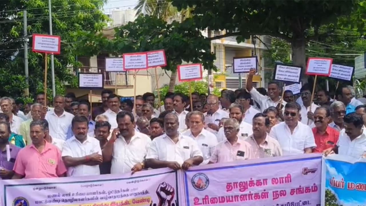 Lorry owners and drivers protest infront of PwD office in Tiruchirappalli (Photo/ANI) Lorry owners and drivers protest infront of PwD office in Tiruchirappalli (Photo/ANI)