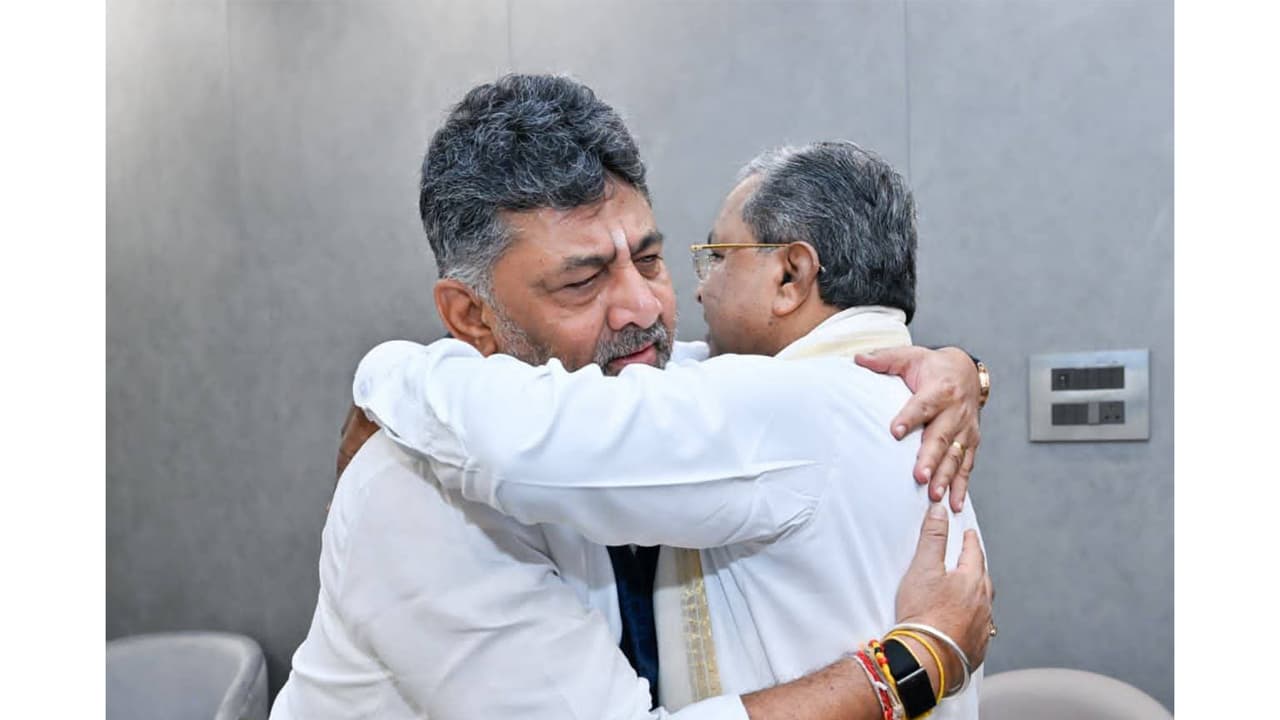 Karnataka Chief Minister Siddaramaiah and Deputy Chief Minister DK Shivakumar hug each other (Photo/X/INCKarnataka) Karnataka Chief Minister Siddaramaiah and Deputy Chief Minister DK Shivakumar hug each other (Photo/X/INCKarnataka)