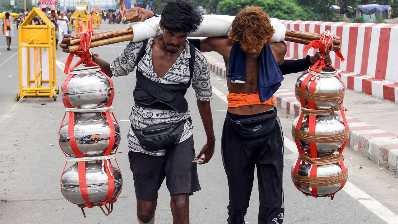 Kanwariyas carrying Ganga water during the Kanwar Yatra in Delhi (File Photo/ANI) Kanwariyas carrying Ganga water during the Kanwar Yatra in Delhi (File Photo/ANI)
