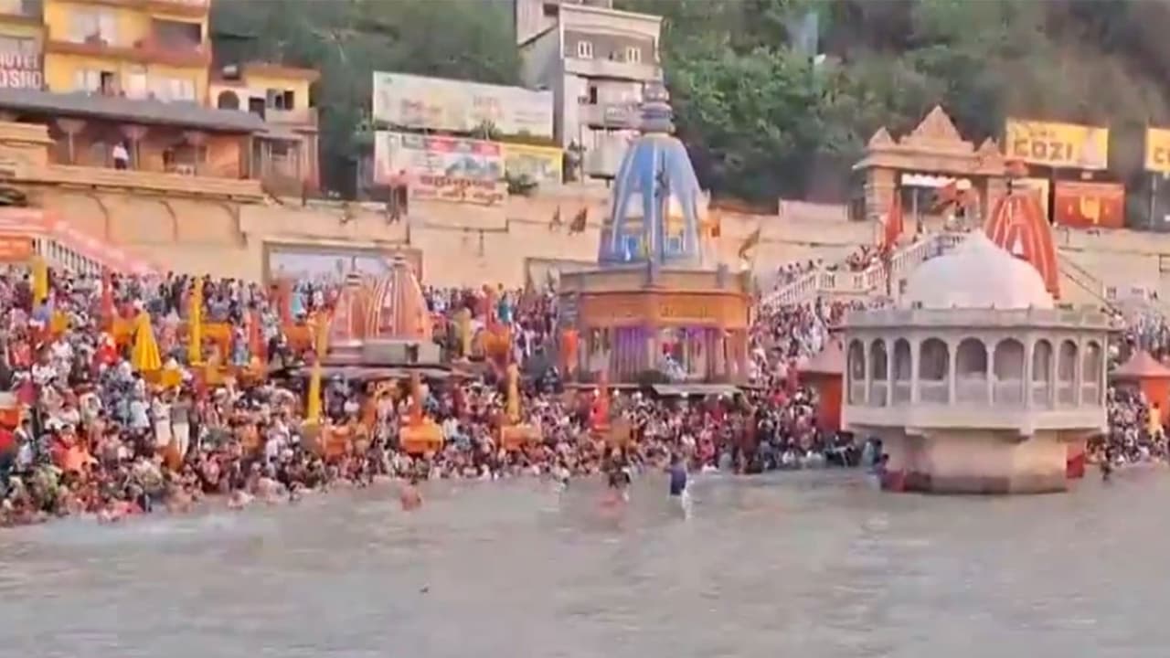 Devotees gathered on banks of Ganga (Photo/ANI) Devotees gathered on banks of Ganga (Photo/ANI)