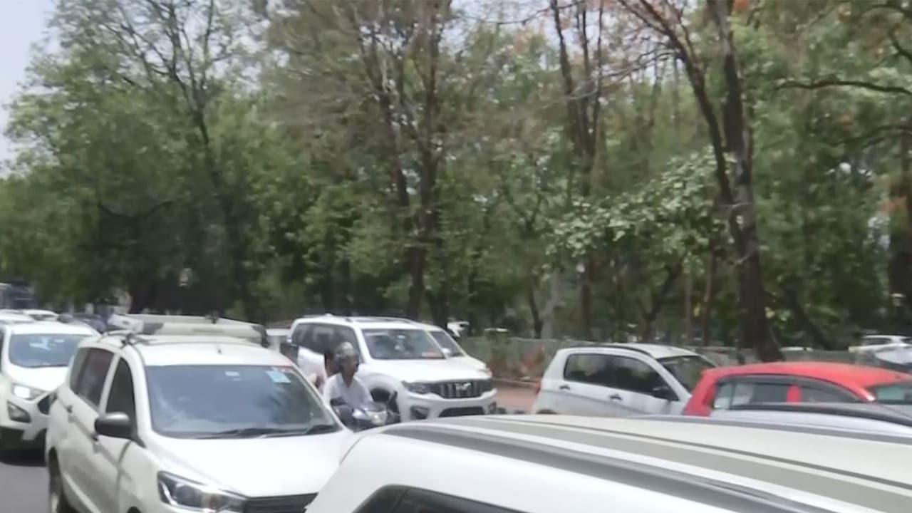 Supporters of BJP leaders with massive vehicle convoy (Photo/ANI) Supporters of BJP leaders with massive vehicle convoy (Photo/ANI)