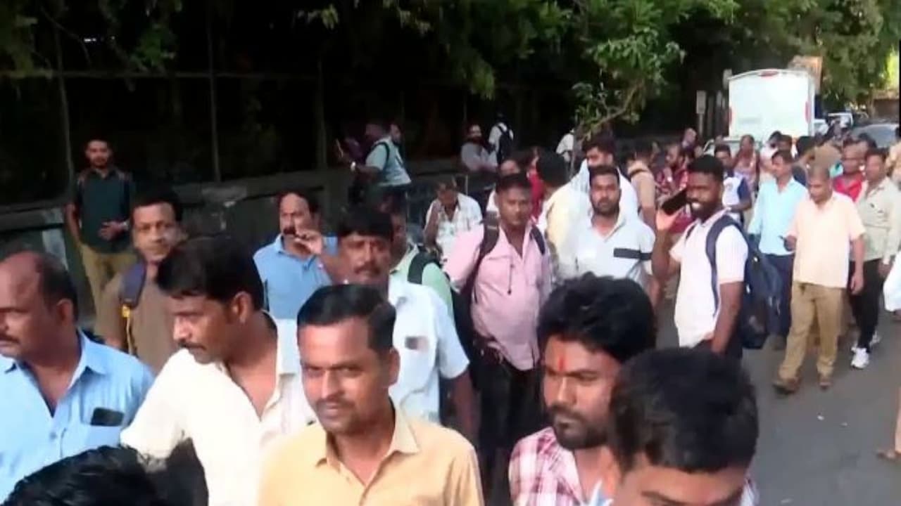 Brihanmumbai Electric Supply and Transport (BEST) bus staff stage a protest at the Dharavi depot (Photo/ANI) Brihanmumbai Electric Supply and Transport (BEST) bus staff stage a protest at the Dharavi depot (Photo/ANI)