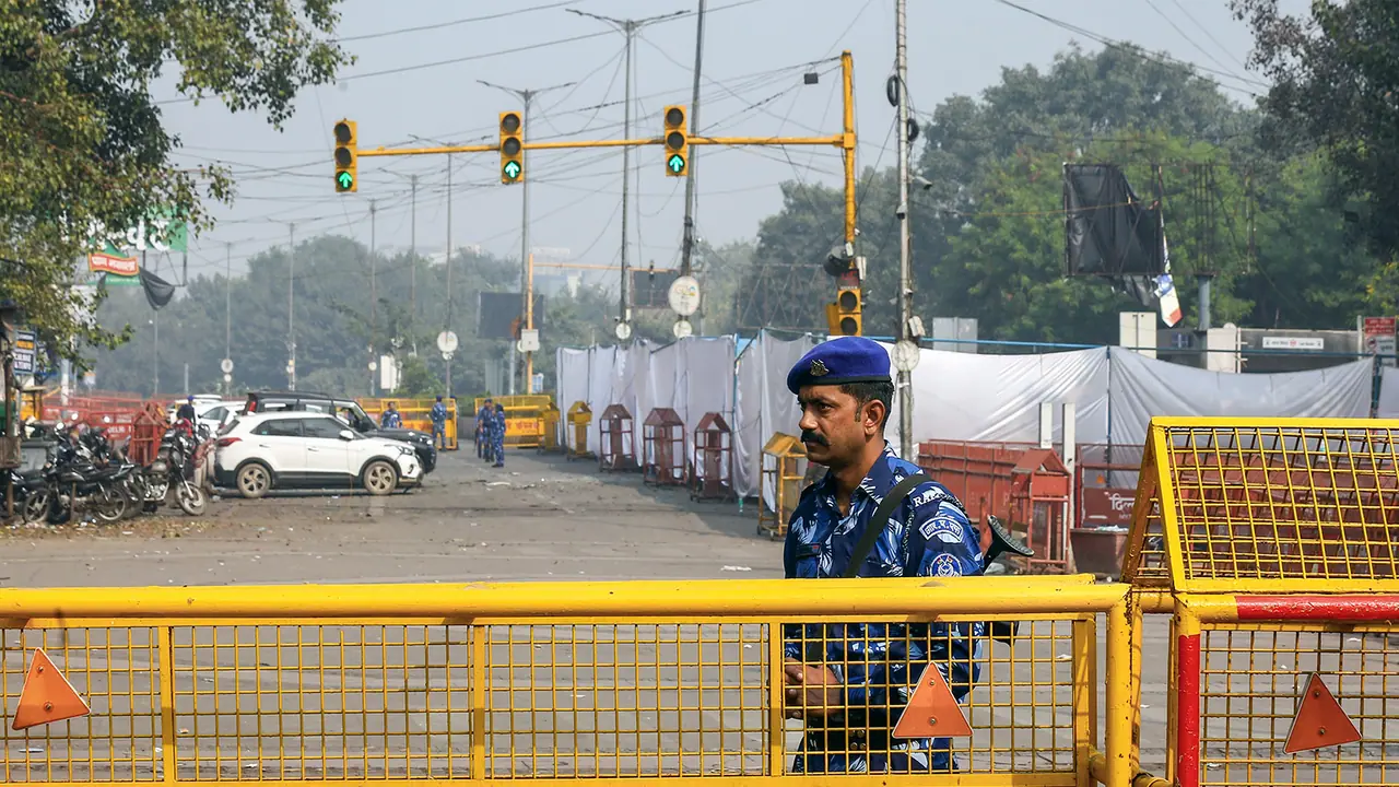 Rapid Action Force stand guard at Red Fort car blast site in New Delhi. (Photo/ANI)