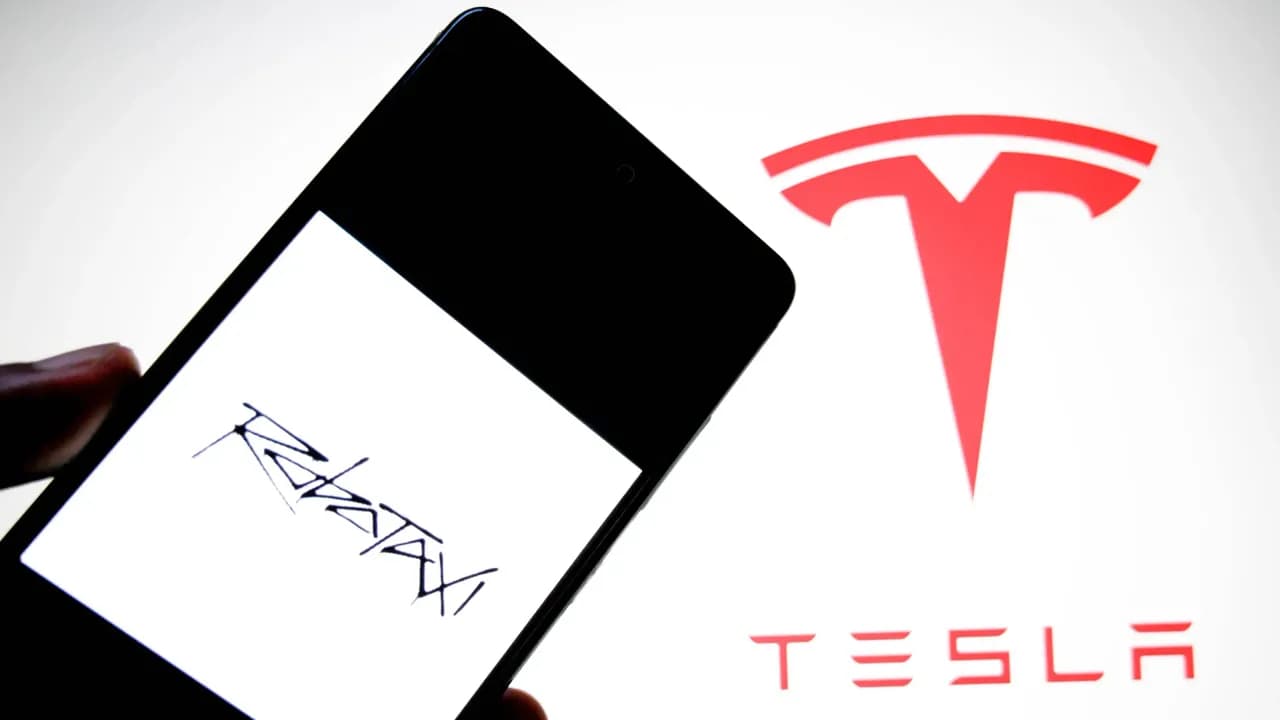 https://stocktwits.com/news articles/markets/equity/tesla robotaxi driving toward profitability says elon musk/chmZagRRReH