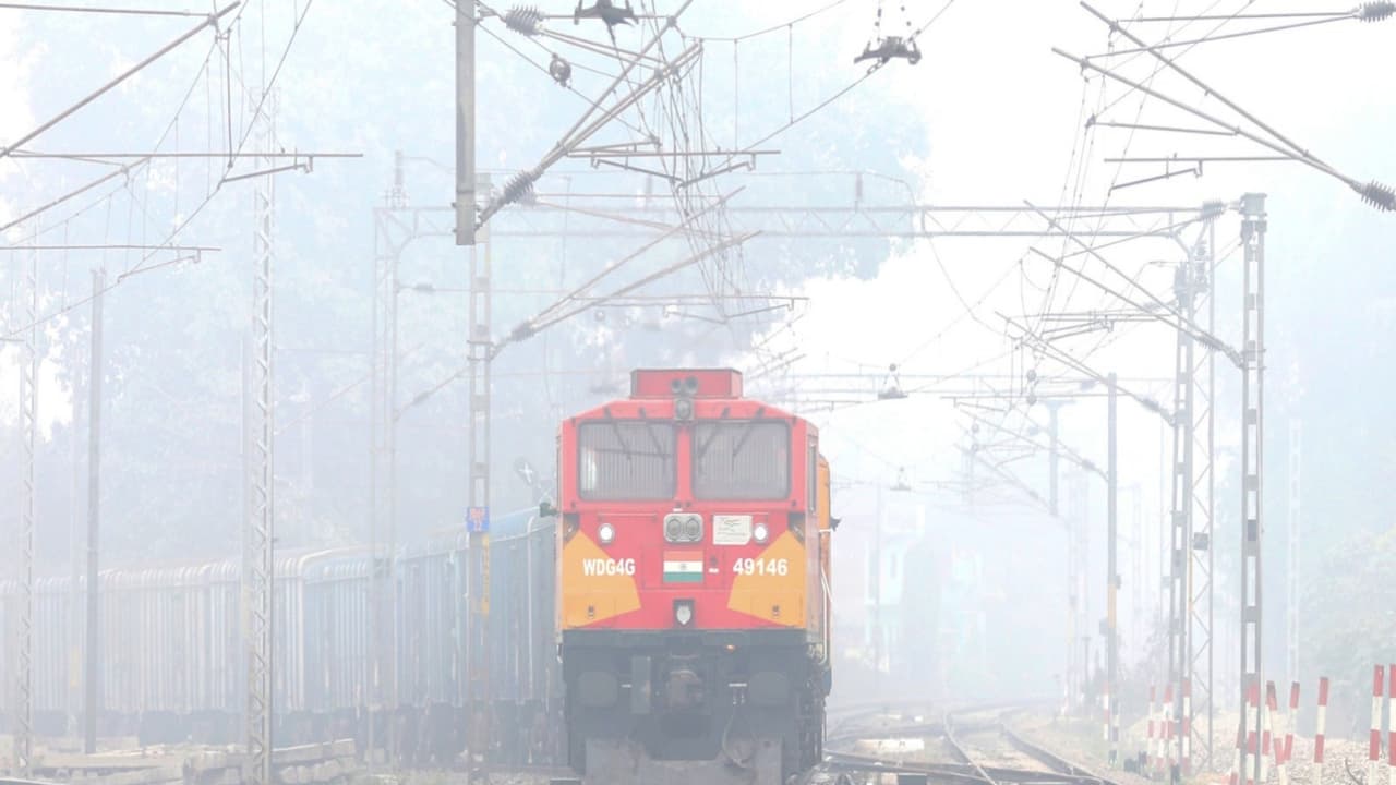 A train passes through dense fog on a cold winter morning, in Lucknow (Photo/ANI) A train passes through dense fog on a cold winter morning, in Lucknow (Photo/ANI)