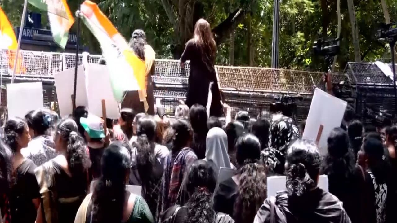 Black clad protest march by Mahila Congress (Photo/ANI) Black clad protest march by Mahila Congress (Photo/ANI)