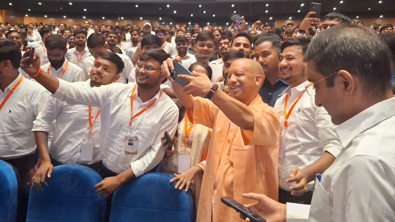 UP Chief Minister Yogi Adityanath takes selfies with youth after an appointment letter distribution event in Lucknow (Photo/ANI) UP Chief Minister Yogi Adityanath takes selfies with youth after an appointment letter distribution event in Lucknow (Photo/ANI)