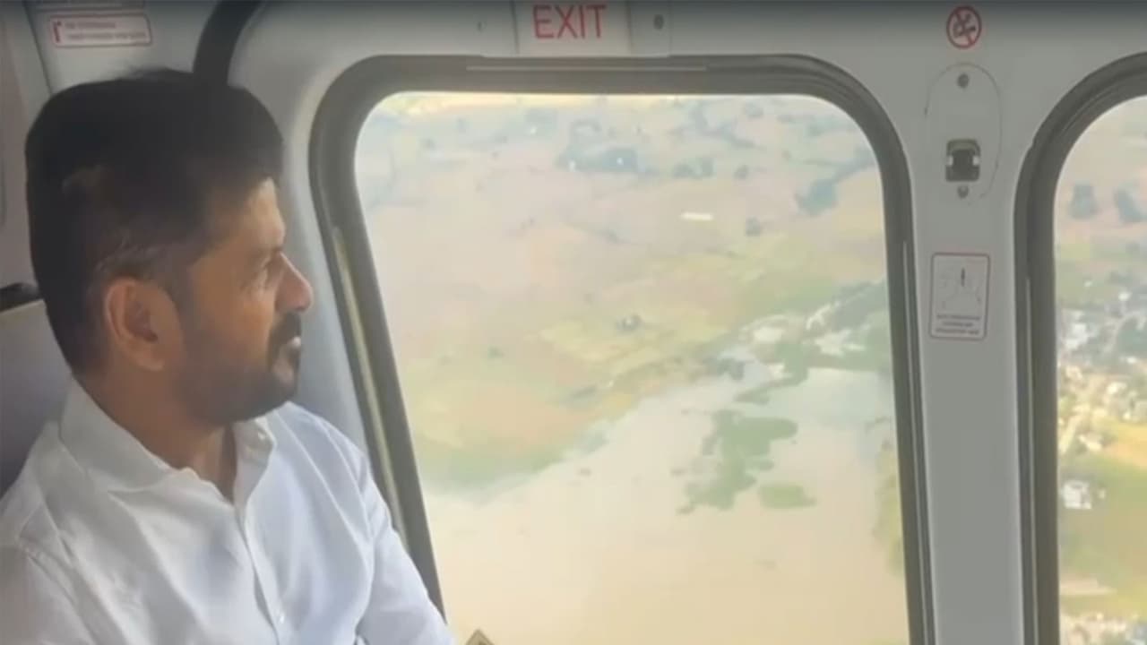 Telangana CM A Revanth Reddy conducts aerial survey of flood ravaged areas. (Photo/ANI) Telangana CM A Revanth Reddy conducts aerial survey of flood ravaged areas. (Photo/ANI)