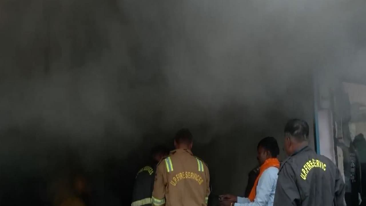 Firefighters controlling the blaze at the garments shop in Gorakhpur (Photo/ANI)