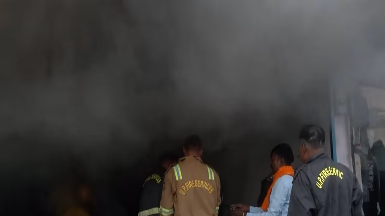 Firefighters controlling the blaze at the garments shop in Gorakhpur (Photo/ANI)